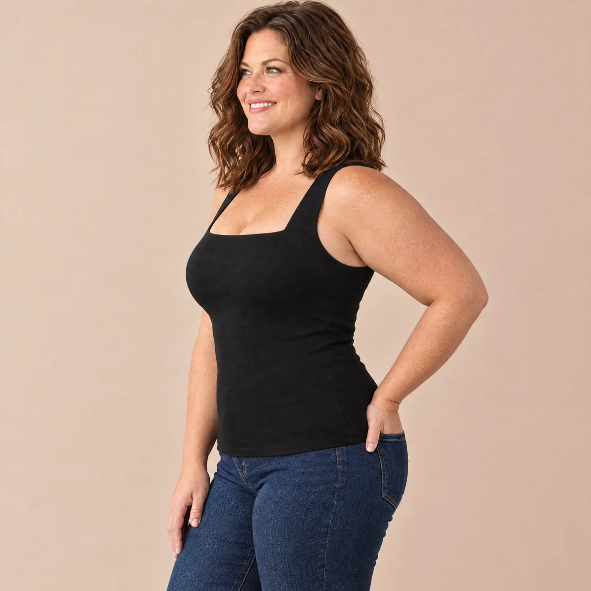 Side view of the Black bra tank showing lift and a smooth line